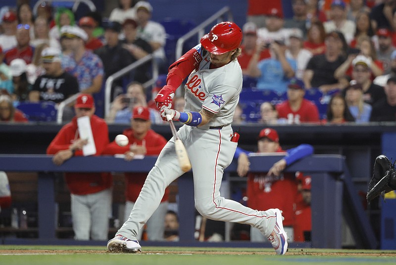 May 3, 2026; Miami, Florida, USA;  Philadelphia Phillies second baseman Bryson Stott (5) hits a home run against the Miami Marlins during the first inning at loanDepot Park. Mandatory Credit: Rhona Wise-Imagn Images