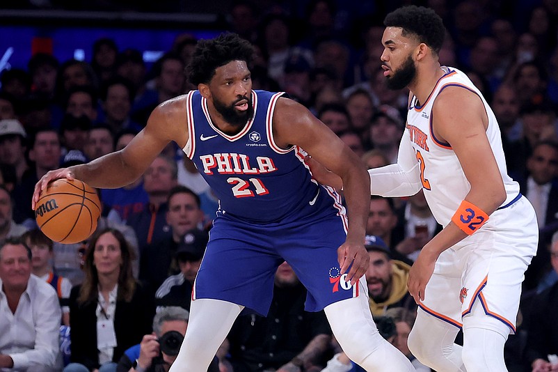 May 4, 2026; New York, New York, USA; Philadelphia 76ers center Joel Embiid (21) controls the ball against New York Knicks center Karl-Anthony Towns (32) during the first quarter of game one of the eastern conference semifinal round of the 2026 NBA Playoffs at Madison Square Garden. Mandatory Credit: Brad Penner-Imagn Images