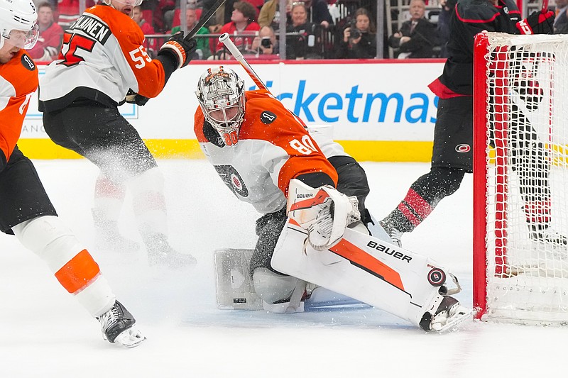 May 4, 2026; Raleigh, North Carolina, USA; Philadelphia Flyers goaltender Dan Vladar (80) makes a save against the Carolina Hurricanes during the third period in game two of the second round of the 2026 Stanley Cup Playoffs at Lenovo Center. Mandatory Credit: James Guillory-Imagn Images