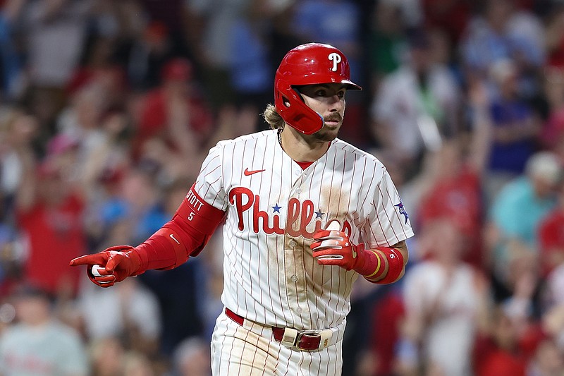 May 5, 2026; Philadelphia, Pennsylvania, USA; Philadelphia Phillies second baseman Bryson Stott (5) hits a two RBI home run against the Athletics during the seventh inning at Citizens Bank Park. Mandatory Credit: Bill Streicher-Imagn Images