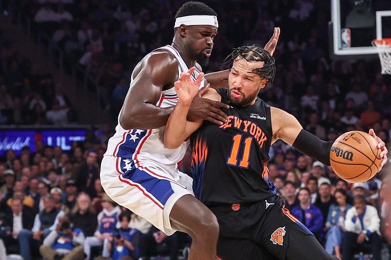 May 6, 2026; New York, New York, USA; New York Knicks guard Jalen Brunson (11) looks to drive past Philadelphia 76ers center Adem Bona (30) during game five of the second round of the 2026 NBA Playoffs at Madison Square Garden. Mandatory Credit: Wendell Cruz-Imagn Images