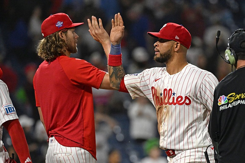 May 6, 2026; Philadelphia, Pennsylvania, USA; Philadelphia Phillies second baseman Edmundo Sosa (33) celebrates win with third baseman Alec Bohm (28) against the Athletics during the eighth inning at Citizens Bank Park. Mandatory Credit: Eric Hartline-Imagn Images