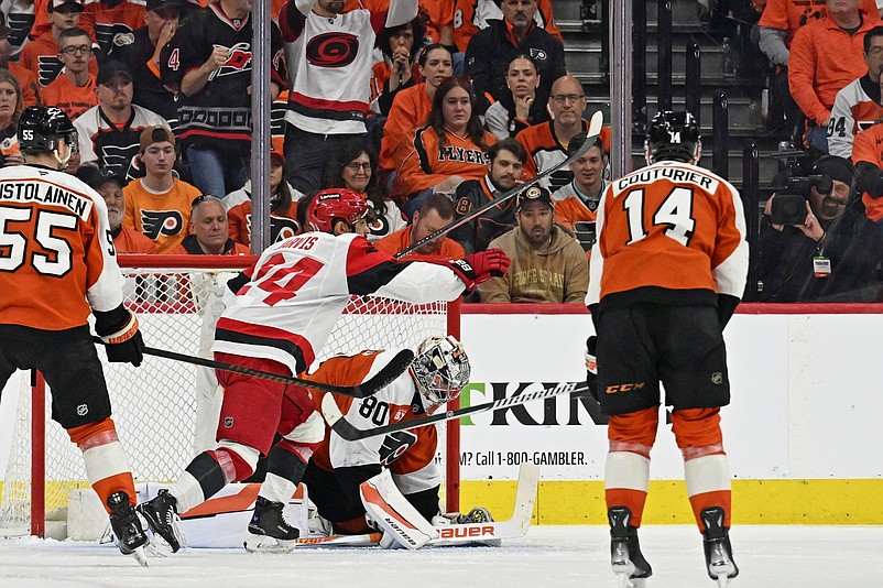 May 7, 2026; Philadelphia, Pennsylvania, USA; Carolina Hurricanes center Seth Jarvis (24) celebrates a goal against Philadelphia Flyers goaltender Dan Vladar (80) scored by right wing Andrei Svechnikov (37) (not pictured) during the third period in game three of the second round of the 2026 Stanley Cup Playoffs at Xfinity Mobile Arena. Mandatory Credit: Eric Hartline-Imagn Images