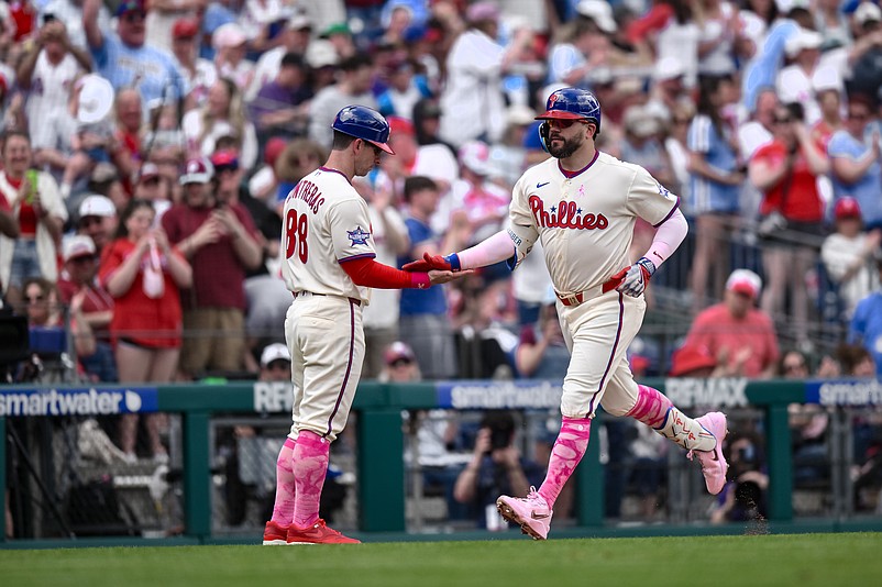 May 10, 2026; Philadelphia, Pennsylvania, USA; Philadelphia Phillies left fielder Kyle Schwarber (12) is greeted at home plate after hitting his second home run of the game against the Colorado Rockies during the second inning at Citizens Bank Park. Mandatory Credit: John Jones-Imagn Images