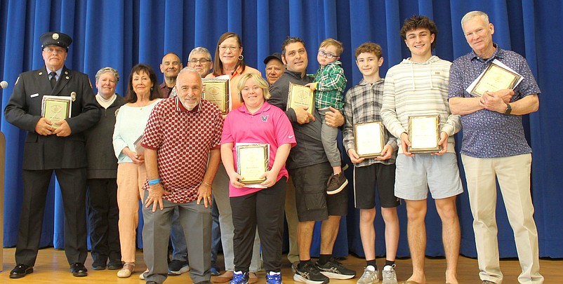Sea Isle City Mayor Leonard Desiderio, front row, left, presents his "Do the Right Thing" awards to community members. (Photos courtesy of Sea Isle City)