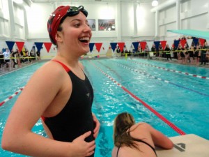 Gabby Breazeale celebrates Ocean City's victory in the decisive 400-meter freestyle relay Monday against Mainland in the South Jersey semifinal.