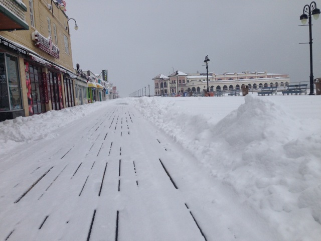 Snow drifts line a plowed strip on the Ocean City Boardwalk on Monday, March 17, after a winter storm dumped about six inches across the island.