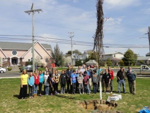 Students from Mrs. Wira's sixth-grade science class at Ocean City Intermediate School participate in a tree planting on Arbor Day in Ocean City, NJ.