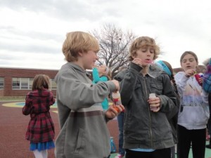 Duke McCarron, 9, and Noah Herrington, 9, both third-graders at Ocean City Primary School, join the fun at Bubbles 4 Autism Day.