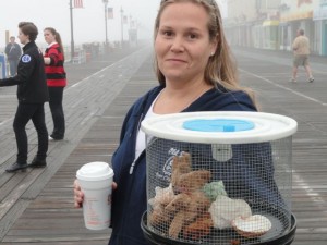 Old Salt and Sting Ray gift shops co-owner Holly Buck delivers the namesake of Martin Z. Mollusk Day.