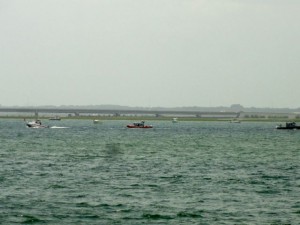 Coast Guard and Marine Police boats operate where a body was found on Thursday, July 3, near the Ocean City-Longport Bridge.