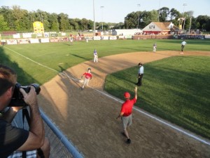 Ocean City-Upper Township's Gannon Brady rounds third base after hitting a home run on just the second pitch of the game.