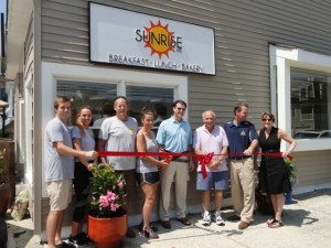 R.J. Idell, Jill Noon, Bob Idell, Sharon Idell, Councilman Mike DeVlieger, landlord Marvin Goldstein, Mayor Jay Gillian and Ocean City Regional Chamber of Commerce Executive Director Michele Gillian mark the opening of Sunrise Cafe in 2014.