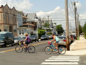 Bicyclists enter the intersection at 11th Street and Wesley Avenue on Aug. 11, 2014.   Credit: Tim Zatzariny Jr.