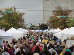 Crowds fill Asbury Avenue shortly after noon on Saturday as the rain ends at the annual Fall Block Party.