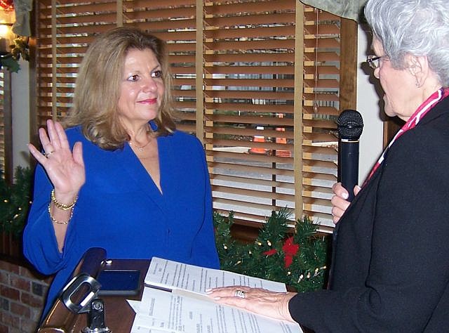 Gloria Votta, RE/MAX At The Shore, is sworn in by Christine Clemans, Goldcoast Sotheby’s International Realty.