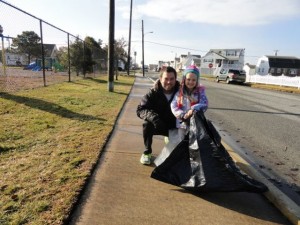 Christian Bickings and his daughter, Caroline, 5, work near the 52 Street Playground in Ocean City, NJ.