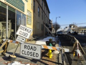 The sidewalk and metered parking beside the Bourse Building on Eighth Street near the Asbury Avenue intersection were barricaded as a precautionary measure in March 2015.