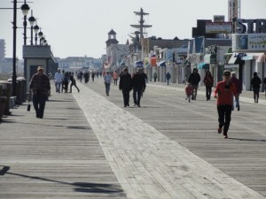 The boardwalk saw a healthy crowd on a Monday afternoon in early March.