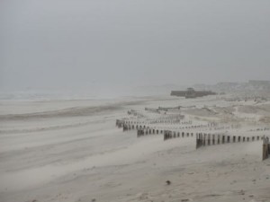 Great Lakes Dock and Dredging Company equipment carries sections of pipeline from 34th Street to 43rd Street to prepare for a beach replenishment project expected to start April 14.