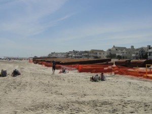 Sections of pipeline are stored just south of the 55th Street entrance.