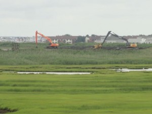 Crews are working to make space at a disposal site for dredged material near Roosevelt Boulevard in Ocean City.