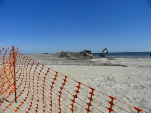 Machinery shapes the dune line, which currently ends where the southernmost house in Ocean City sits. The dune line will extend another couple hundred feet.