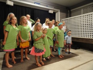 Participants in the kids' talent show get T-shirts for their performances.