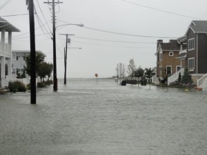 The bay tops the bulkhead at 11th Street during high tide early Saturday afternoon.