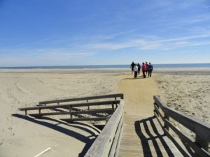 A new configuration of the boardwalk entrance to 58th Street Beach puts beach visitors at the back edge of a new dune line.