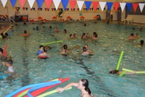 Families enjoy the open pool time at the Ocean City Aquatics and Fitness Center, a first-time event for First Night.