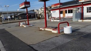 Abandoned Getty and BP stations sit at the foot of the Ninth Street Bridge.