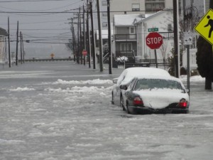 Flood waters stretch from the bay to Asbury Avenue on Fourth Street in Ocean City, NJ on Saturday morning.