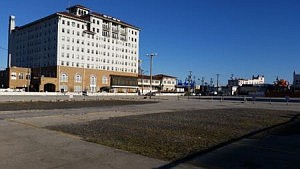 Soleil Resort would rise on what is now a parking lot in the shadow of the historic Flanders Hotel in the background. 