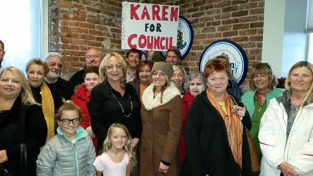 Councilwoman Karen Bergman (center, in black outfit) joined her supporters at City Hall on Thursday during a campaign kickoff for the May election.