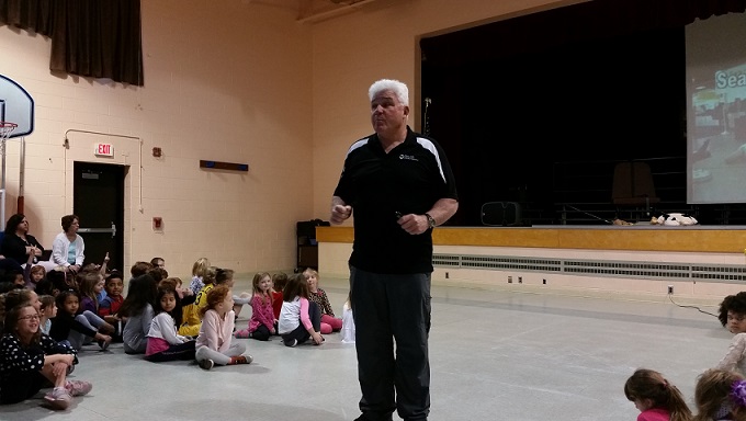 Children listened while Wayne Shelton spoke about sear belt safety.5