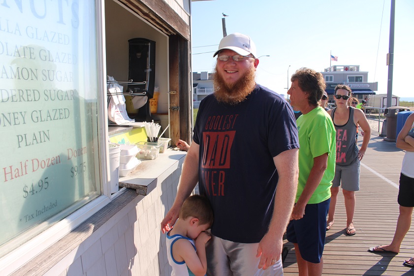 Jonathan Tanis and three-year-old Noah, of Easton, PA, wait for donuts at Brown's Restaurant.