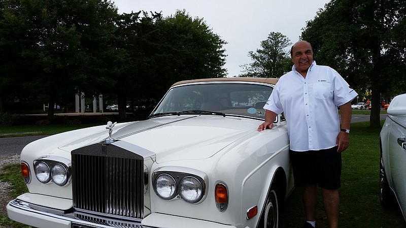 Frank Kerbeck, owner of the Kerbeck auto dealerships in New Jersey along with his brothers Charlie and George, shows off his personal 1991 Rolls-Royce Corniche convertible.