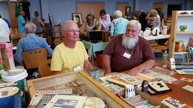 Jim Boice, left, joined by Historical Society trustee John Loeper, sold his collection of Ocean City memorabilia.