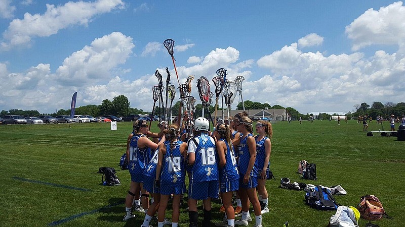 New Jersey South All Stars give a cheer before beating Lacrosse Monkey of Minnesota on Tuesday in the US Lacrosse Under 15 national championships near Indianapolis, Indiana. 