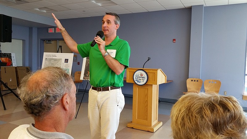 Eric Rosina, project manager for ACT Engineering, the consulting firm overseeing the city’s dredging program, explains details of the projects to the audience.