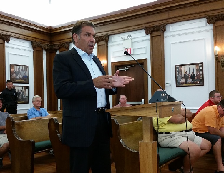 Paul Chiolo, owner of the Keller Williams realty firm, tells City Council of his plans for a new office complex for his company.