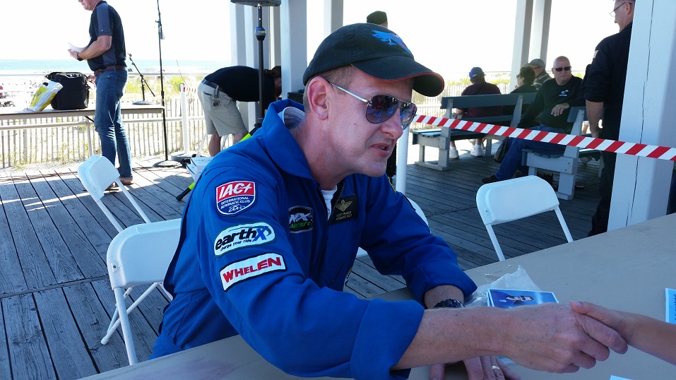 Pilot Scott Francis shakes hands with one air show fan.