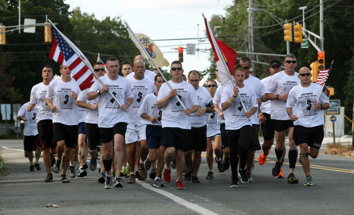 One Mile, One Flag, One Hero… Each mile of the Run is dedicated to a NJ Hero and the Core Run Team will stop at every Hero Marker (every mile) and present an American Flag and a personal biographical card to the waiting family members, friends and comrades. The intent is to create a 190- mile long memorial trail through New Jersey 