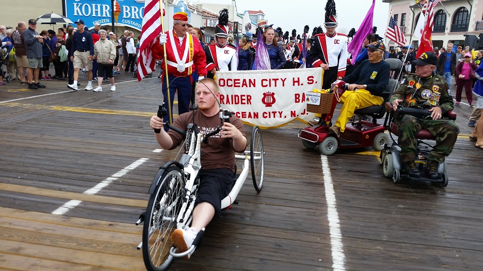 Former Army Sgt. Jesse Wallace, who lost his right leg in combat in Afghanistan, rode a recumbent cycle to lead the Walk for the Wounded.