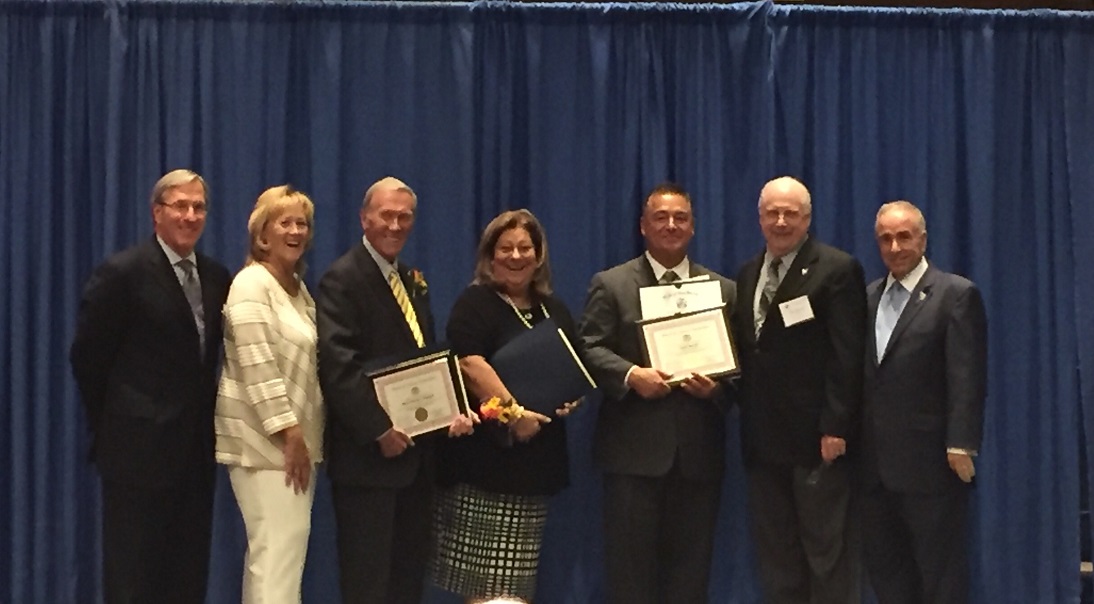 On stage from the left is Freeholder Will Morey; Freeholder Marie Hayes; Honoree Mayor of Avalon Martin Paliughi; Honoree and Avalon First Lady Lynda Paliughi; Honoree James Bennett; Freeholder Jerry Thornton; Freeholder and Mayor Lenny Desiderio