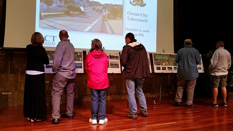 Residents looked over conceptual plans for creating open space and other proposed improvements to the Ninth Street corridor.