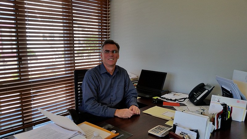 Booth, pictured at his office on 34th Street in Ocean City, noted that sales of primary homes have been strong.