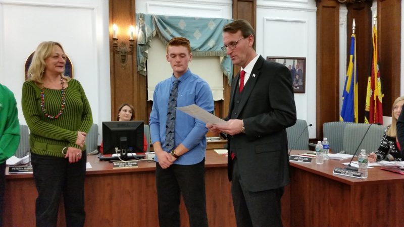 Boy Scout Troop 32 member Zachary Salvatore Lisa, flanked by Councilwoman Karen Bergman and Mayor Gillian, was honored for achieving the rank of Eagle Scout.