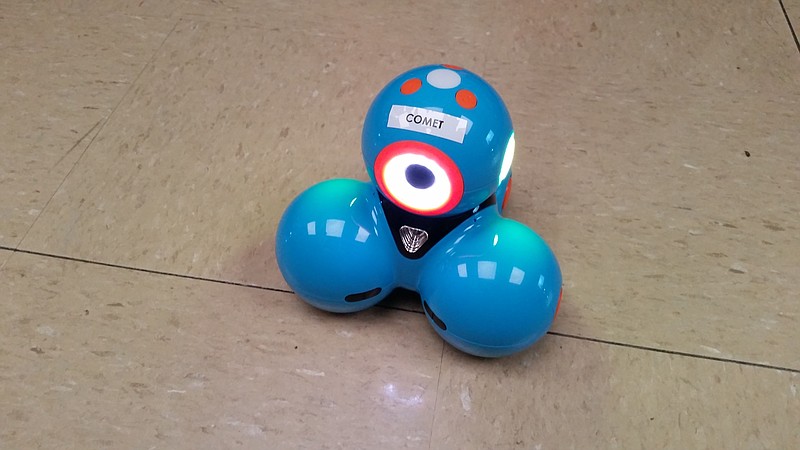 One of eight tiny robots that help introduce students to emerging technologies.